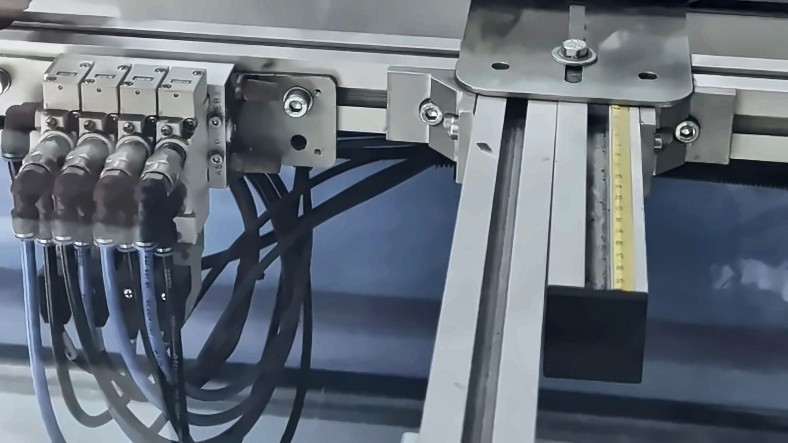 Pneumatic valves and the pusher rail of the packing machine
